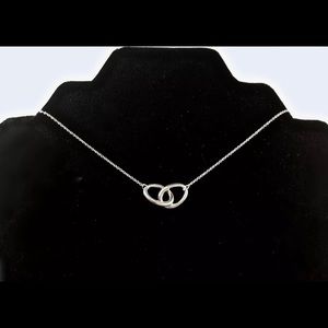 Tiffany & Co 16” interlocking oval necklace.